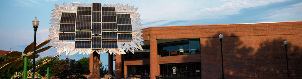 tree solar panel art installation